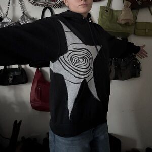 Black Hoodie with Spiral Star Design